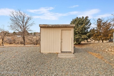 Experience the perfect blend of comfort and scenic beauty in on Prescott Golf and Country Club in Arizona - for sale on GolfHomes.com, golf home, golf lot