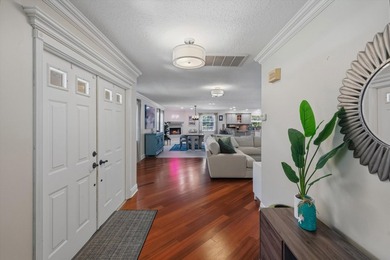 Live the lifestyle you've been dreaming of in this impressive on Jupiter Country Club in Florida - for sale on GolfHomes.com, golf home, golf lot