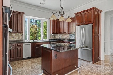 Beautifully situated on a quiet cul-de-sac, this elegant home on The Landings Club - Marshwood in Georgia - for sale on GolfHomes.com, golf home, golf lot