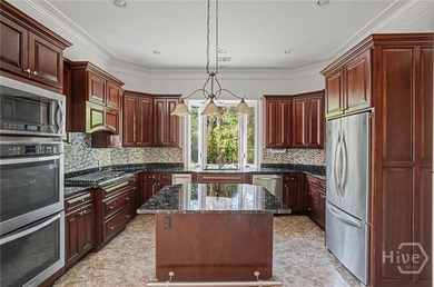 Beautifully situated on a quiet cul-de-sac, this elegant home on The Landings Club - Marshwood in Georgia - for sale on GolfHomes.com, golf home, golf lot