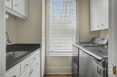 Beautifully situated on a quiet cul-de-sac, this elegant home on The Landings Club - Marshwood in Georgia - for sale on GolfHomes.com, golf home, golf lot