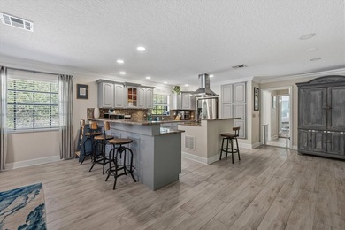 Live the lifestyle you've been dreaming of in this impressive on Jupiter Country Club in Florida - for sale on GolfHomes.com, golf home, golf lot