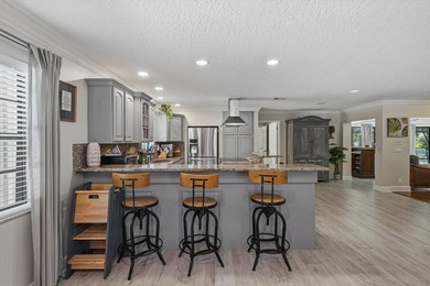 Live the lifestyle you've been dreaming of in this impressive on Jupiter Country Club in Florida - for sale on GolfHomes.com, golf home, golf lot