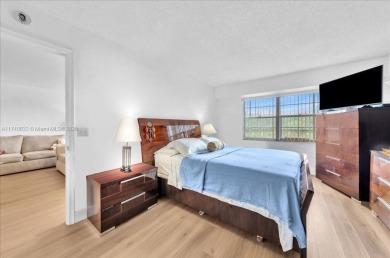 This beautiful 2-bedroom, 2-bathroom condo offers stunning pool on Flamingo Lakes Country Club in Florida - for sale on GolfHomes.com, golf home, golf lot