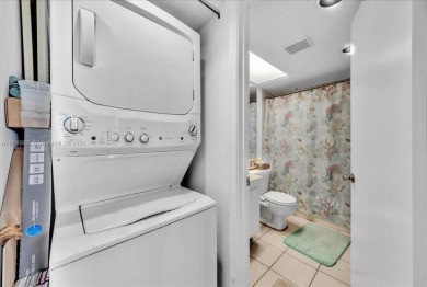 This beautiful 2-bedroom, 2-bathroom condo offers stunning pool on Flamingo Lakes Country Club in Florida - for sale on GolfHomes.com, golf home, golf lot