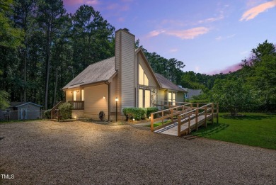 Another Lake Royale beauty with a backyard unlike any other! on River Golf and County Club at Lake Royale in North Carolina - for sale on GolfHomes.com, golf home, golf lot