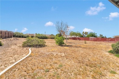 Welcome to this charming 3-bedroom, 2-bath home nestled in on Hesperia Golf and Country Club in California - for sale on GolfHomes.com, golf home, golf lot