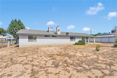 Welcome to this charming 3-bedroom, 2-bath home nestled in on Hesperia Golf and Country Club in California - for sale on GolfHomes.com, golf home, golf lot