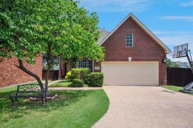 Situated on an oversized waterfront lot within the zero lot line on Hackberry Creek Country Club in Texas - for sale on GolfHomes.com, golf home, golf lot