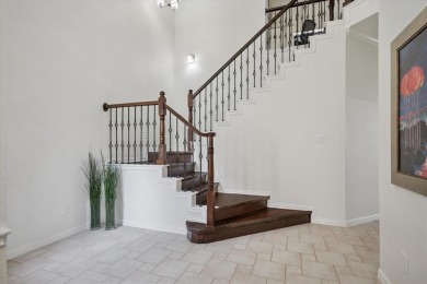 Situated on an oversized waterfront lot within the zero lot line on Hackberry Creek Country Club in Texas - for sale on GolfHomes.com, golf home, golf lot