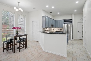 Situated on an oversized waterfront lot within the zero lot line on Hackberry Creek Country Club in Texas - for sale on GolfHomes.com, golf home, golf lot