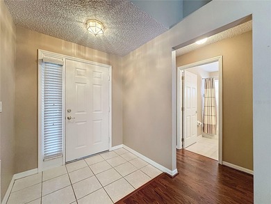 Canterbury model on a sloped golf course lot. that is heading to on Kings Ridge Golf Club in Florida - for sale on GolfHomes.com, golf home, golf lot