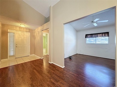 Canterbury model on a sloped golf course lot. that is heading to on Kings Ridge Golf Club in Florida - for sale on GolfHomes.com, golf home, golf lot