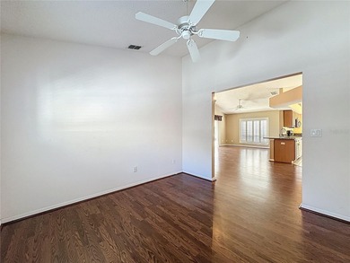 Canterbury model on a sloped golf course lot. that is heading to on Kings Ridge Golf Club in Florida - for sale on GolfHomes.com, golf home, golf lot