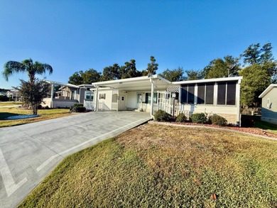 Home is located in Water Oak Country Club Estates an active 55 on Water Oak Country Club Estates in Florida - for sale on GolfHomes.com, golf home, golf lot