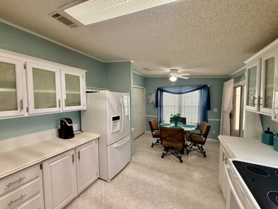 Home is located in Water Oak Country Club Estates an active 55 on Water Oak Country Club Estates in Florida - for sale on GolfHomes.com, golf home, golf lot