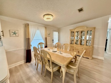 Home is located in Water Oak Country Club Estates an active 55 on Water Oak Country Club Estates in Florida - for sale on GolfHomes.com, golf home, golf lot