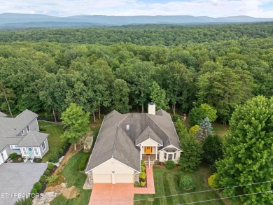 As you enter the home you're welcomed by Cathedral ceilings, and on Stonehenge Golf Course in Tennessee - for sale on GolfHomes.com, golf home, golf lot