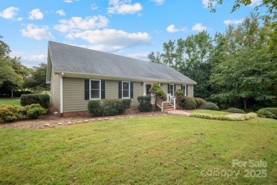 Welcome home to this stunningly remodeled 3BR/2BA residence on Rock Barn Golf and Spa in North Carolina - for sale on GolfHomes.com, golf home, golf lot