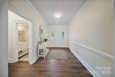 Welcome home to this stunningly remodeled 3BR/2BA residence on Rock Barn Golf and Spa in North Carolina - for sale on GolfHomes.com, golf home, golf lot