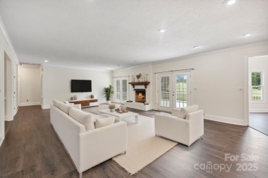 Welcome home to this stunningly remodeled 3BR/2BA residence on Rock Barn Golf and Spa in North Carolina - for sale on GolfHomes.com, golf home, golf lot