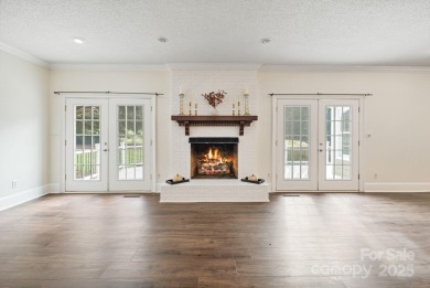 Welcome home to this stunningly remodeled 3BR/2BA residence on Rock Barn Golf and Spa in North Carolina - for sale on GolfHomes.com, golf home, golf lot