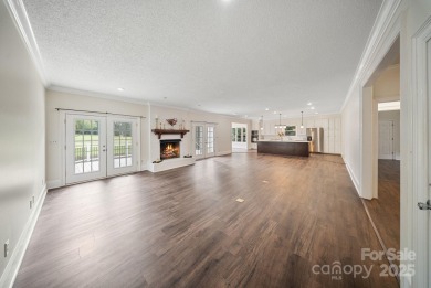 Welcome home to this stunningly remodeled 3BR/2BA residence on Rock Barn Golf and Spa in North Carolina - for sale on GolfHomes.com, golf home, golf lot