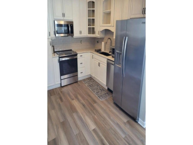 Recently updated 2 bed, 2 bath condo in highly sought after on Saddle Ridge Golf Club in Wisconsin - for sale on GolfHomes.com, golf home, golf lot