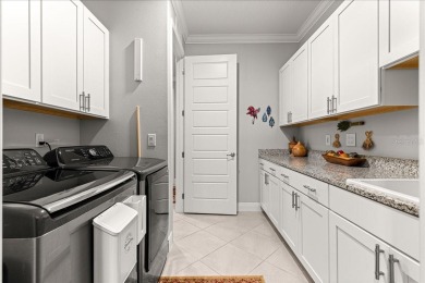 Welcome to this stunning Wellington model home located in the on On Top of the World Golf Course in Florida - for sale on GolfHomes.com, golf home, golf lot