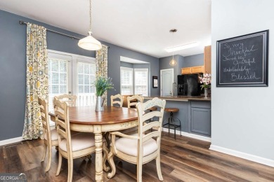 Welcome to this beautifully maintained three-level end-unit on Sugar Hill Golf Club in Georgia - for sale on GolfHomes.com, golf home, golf lot