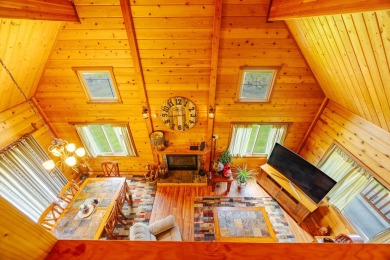 You have GOT to see this stunning cedar home nestled on the on Volcano Golf and Country Club in Hawaii - for sale on GolfHomes.com, golf home, golf lot