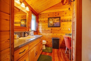 You have GOT to see this stunning cedar home nestled on the on Volcano Golf and Country Club in Hawaii - for sale on GolfHomes.com, golf home, golf lot