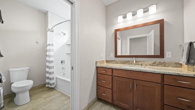 Perfectly positioned for effortless, no-step living with on Adobe Creek National Golf Course in Colorado - for sale on GolfHomes.com, golf home, golf lot