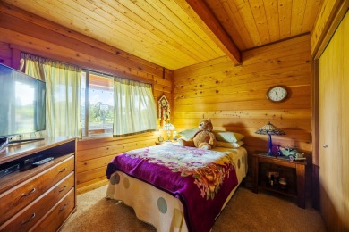 You have GOT to see this stunning cedar home nestled on the on Volcano Golf and Country Club in Hawaii - for sale on GolfHomes.com, golf home, golf lot