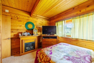 You have GOT to see this stunning cedar home nestled on the on Volcano Golf and Country Club in Hawaii - for sale on GolfHomes.com, golf home, golf lot