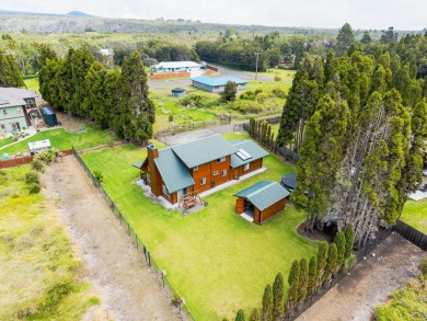 You have GOT to see this stunning cedar home nestled on the on Volcano Golf and Country Club in Hawaii - for sale on GolfHomes.com, golf home, golf lot