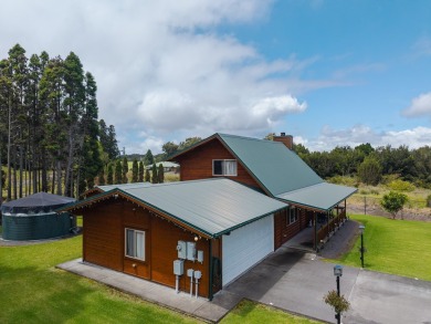 You have GOT to see this stunning cedar home nestled on the on Volcano Golf and Country Club in Hawaii - for sale on GolfHomes.com, golf home, golf lot