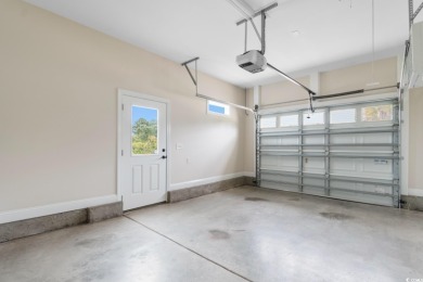 Welcome to this stunning, custom-built home by Jimmy Edwards in on Wild Wing Plantation in South Carolina - for sale on GolfHomes.com, golf home, golf lot