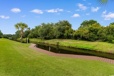 Welcome to this stunning, custom-built home by Jimmy Edwards in on Wild Wing Plantation in South Carolina - for sale on GolfHomes.com, golf home, golf lot