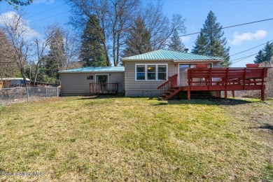 Nestled in the tranquil surroundings of Twin Lakes, this on Twin Lakes Village Golf Course in Idaho - for sale on GolfHomes.com, golf home, golf lot