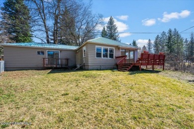 Nestled in the tranquil surroundings of Twin Lakes, this on Twin Lakes Village Golf Course in Idaho - for sale on GolfHomes.com, golf home, golf lot