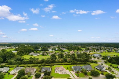 Welcome to this stunning, custom-built home by Jimmy Edwards in on Wild Wing Plantation in South Carolina - for sale on GolfHomes.com, golf home, golf lot