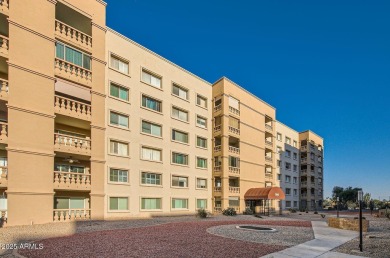 PERFECT LOCATION! LOVELY & BRIGHT 2 Bedroom, 2 Bath Penthouse on Scottsdale Shadows in Arizona - for sale on GolfHomes.com, golf home, golf lot