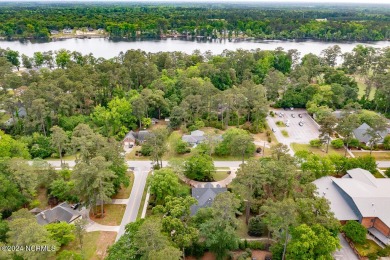 Nestled on 0.95 acre lot in the heart of Trent Woods, this on New Bern Golf and Country Club in North Carolina - for sale on GolfHomes.com, golf home, golf lot