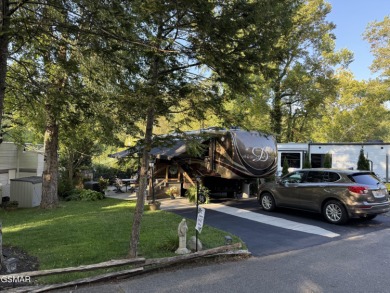 Gorgeous RV lot with a beautifully manicured and landscaped yard on Bent Creek Golf Course in Tennessee - for sale on GolfHomes.com, golf home, golf lot