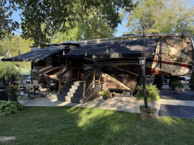 Gorgeous RV lot with a beautifully manicured and landscaped yard on Bent Creek Golf Course in Tennessee - for sale on GolfHomes.com, golf home, golf lot