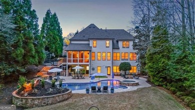 This stunning luxury home at 4027 Hickory Fairway Drive on The Golf Club At Bradshaw Farm in Georgia - for sale on GolfHomes.com, golf home, golf lot