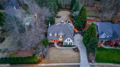This stunning luxury home at 4027 Hickory Fairway Drive on The Golf Club At Bradshaw Farm in Georgia - for sale on GolfHomes.com, golf home, golf lot