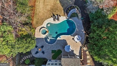 This stunning luxury home at 4027 Hickory Fairway Drive on The Golf Club At Bradshaw Farm in Georgia - for sale on GolfHomes.com, golf home, golf lot