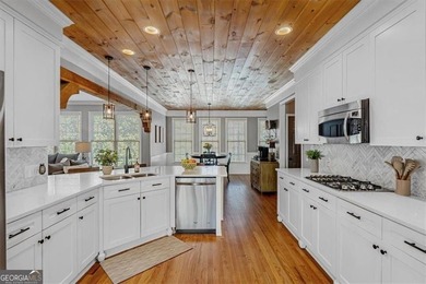 This stunning luxury home at 4027 Hickory Fairway Drive on The Golf Club At Bradshaw Farm in Georgia - for sale on GolfHomes.com, golf home, golf lot